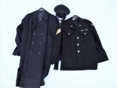 A Corps Of Commissionaires jacket by Hobson & Sons Ltd, an overcoat and peaked cap.