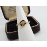 18ct gold - a 18ct gold trilogy ring set with old cut crossover diamonds, stamped 18 ct, size I,