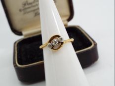 18ct gold - a 18ct gold trilogy ring set with old cut crossover diamonds, stamped 18 ct, size I,