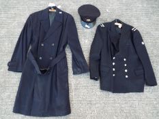 A jacket bearing fire brigade shoulder insignia,