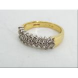 18ct gold - a 18 ct gold ring set with eighteen diamond, stamped .76, size N. approx weight 5.