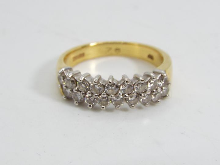 18ct gold - a 18 ct gold ring set with eighteen diamond, stamped .76, size N. approx weight 5. - Image 4 of 5