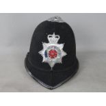 A vintage policeman's helmet