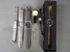 Six modern wristwatches to include seiko, Avia and similar, a 14kt gold tie pin set with pearl,