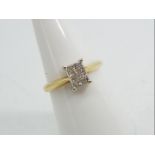 18ct gold - a 18 ct gold ring set with twelve princess cut diamonds, stamped 750, size N, approx 3.