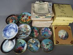 A quantity of collector plates, part boxed to include Chinese, Disney and similar.