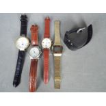 A small collection of wristwatches including a vintage Sekonda digital watch and similar.