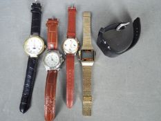 A small collection of wristwatches including a vintage Sekonda digital watch and similar.