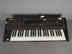 A Korg Delta DL-50 electronic synthesizer.