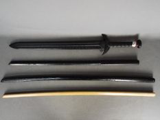 Three Bokken wooden training swords and an HDP roman training sword.