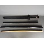 Three Bokken wooden training swords and an HDP roman training sword.