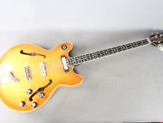 A vintage Eko Barracuda 990 hollow body bass guitar,