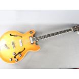 A vintage Eko Barracuda 990 hollow body bass guitar,