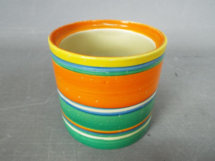 A Clarice Cliff cylindrical pot, banded in colours, printed Newport Pottery Bizarre mark in black, - Image 2 of 3