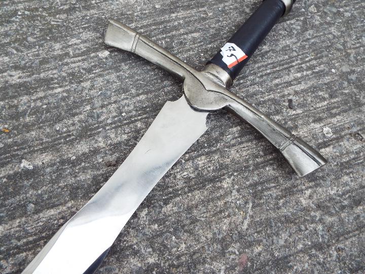 A replica two-handed broad sword with metal pommel and cross-guard, faux leather handle, - Image 3 of 5