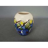 Moorcroft - a Moorcroft vase in the Eight Maids a Milking design,