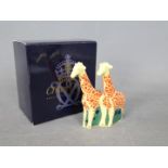 Royal Crown Derby - a pair of Royal Crown Derby giraffes approx height 7 cm (h),