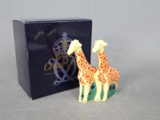 Royal Crown Derby - a pair of Royal Crown Derby giraffes approx height 7 cm (h),