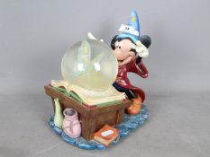 A Disney musical snow globe, 'Fantasia', approximately 25 cm (h).