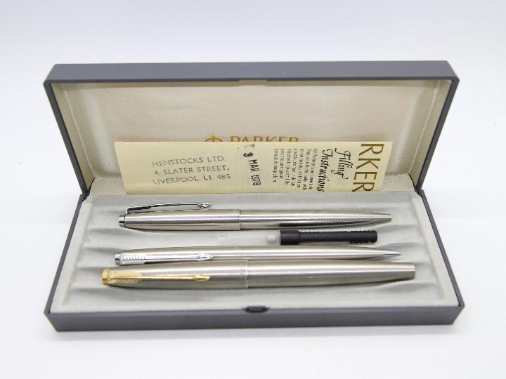 A collection of pens and pencil comprising a Parker ballpoint, Parker propelling pencil, - Image 3 of 3