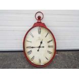 A large, decorative wall clock, approximately 95 cm x 56 cm.