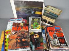 A collection of literature to include war related magazines,