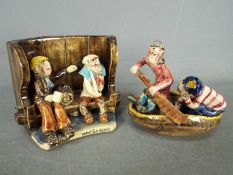 Runnaford Pottery - Two Will Young 'Widecombe Fair' figures comprising a two character bench and a