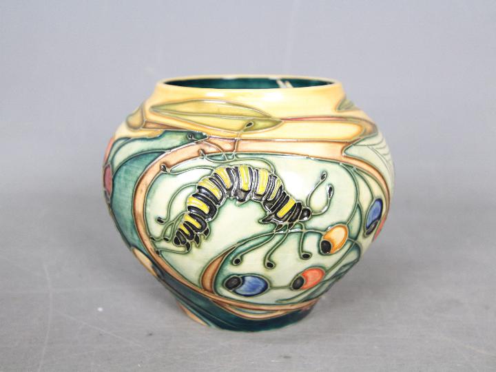 Moorcroft - A Moorcroft Pottery vase decorated in the Hartgring pattern,