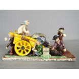 Runnaford Pottery - A Will Young 'Widecombe Fair' figural group 'Coming From The Fair',