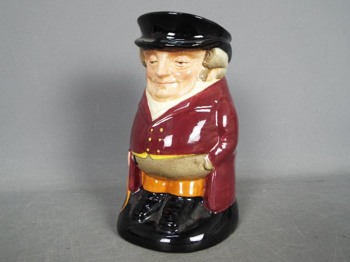 A large Royal Doulton Toby Jug 'The Huntsman', white shirt, yellow buttons and yellow waistcoat,