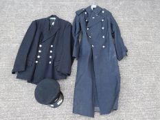 Bootle Fire Brigade jacket and overcoat and a Merseyside Fire Brigade peaked cap.