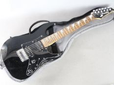 An Ibanez Mikro children's electric guitar in 'Black Night' finish with soft carry case.