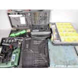 Lot to include a power drill, precision electric saw, AA car maintenance course,
