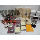 Unused Retail Stock - Nine sets white metal of napkin rings, three sets of place mats,
