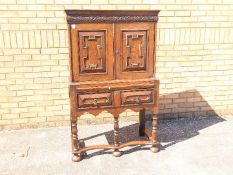 Two part cabinet desk with upper twin door cupboard,