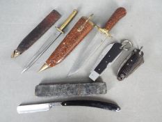 A small collection of knives,