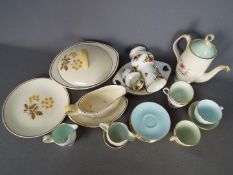 A quantity of Royal Albert 'Elfin' pattern tea wares and a small quantity of 'Old Country Roses'