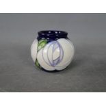 Moorcroft - a Moorcroft vase in the White Rose design, approx height 5.