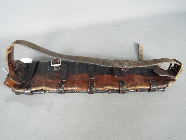 A vintage leather ammunition belt with five pouches. - Image 4 of 4