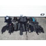 A collection of paintball and similar clothing and accessories.