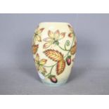 Moorcroft - A Moorcroft Pottery vase in the Serviceberry pattern,
