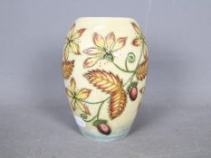 Moorcroft - A Moorcroft Pottery vase in the Serviceberry pattern,