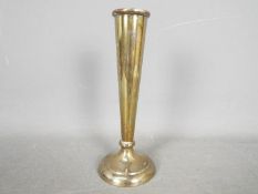 A George V hallmarked silver vase of trumpet form, Sheffield assay 1930,