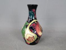 Moorcroft - a Moorcroft vase in the Queen's Choice design,
