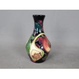 Moorcroft - a Moorcroft vase in the Queen's Choice design,