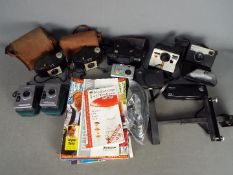 Photography - A collection of cameras to include Polaroid, Kodak, Chinon and other.