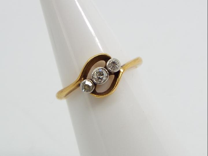 18ct gold - a 18ct gold trilogy ring set with old cut crossover diamonds, stamped 18 ct, size I, - Image 2 of 5