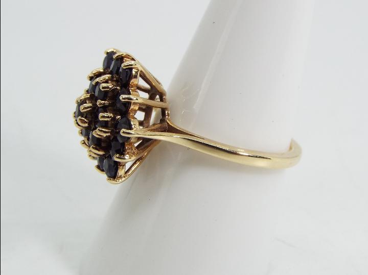 9ct gold - a 9 ct gold sapphire cluster ring, cluster measures 2 cm (d), size O½, approx weight 4. - Image 2 of 5