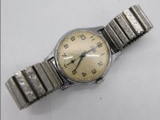 A vintage Smiths Astral, 15 jewel, gentleman's wristwatch on Fixo-Flex strap,