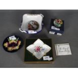 A small mixed lot of ceramics to include a Moorcroft Pottery trinket dish decorated with hibiscus